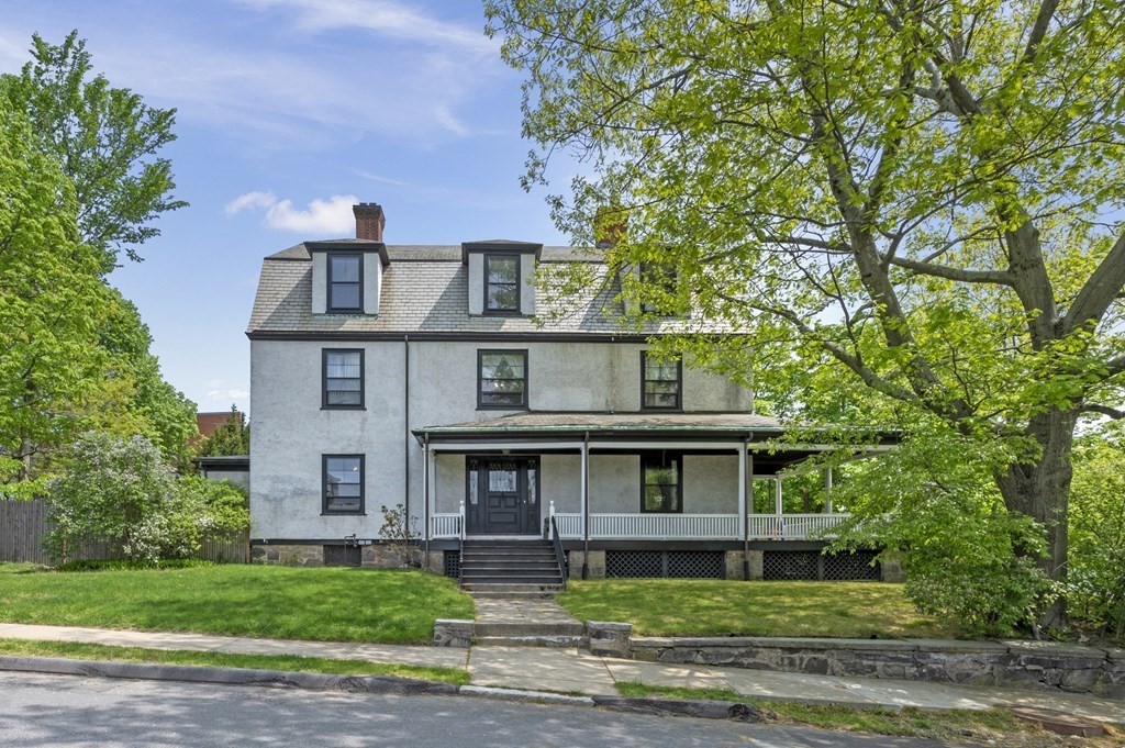 3 Philbrick Road Brookline, MA 02445 - Photo 1 of 1 a front view of a house with a yard