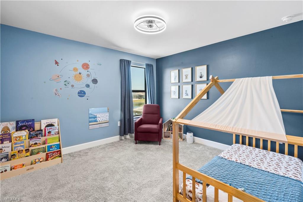 20250 Napa Loop Estero, FL 33928 - Photo 14 of 33 a view of livingroom with furniture and toys