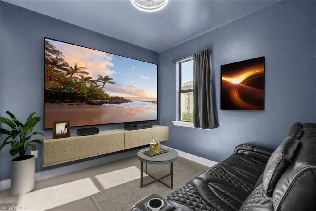 20250 Napa Loop Estero, FL 33928 - Photo 19 of 33 a living room with furniture and a flat screen tv