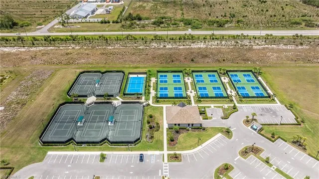an aerial view of a pool patio swimming pool and outdoor seating