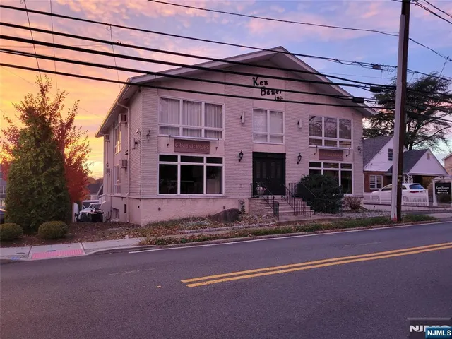a view of a house with a street