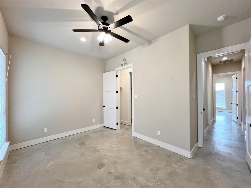 1141 Veal Station Road Springtown, TX 76082 - Photo 13 of 24 wooden floor in an empty room