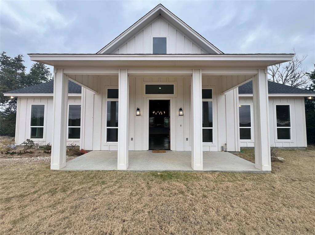 1141 Veal Station Road Springtown, TX 76082 - Photo 2 of 24 front view of a house with a yard