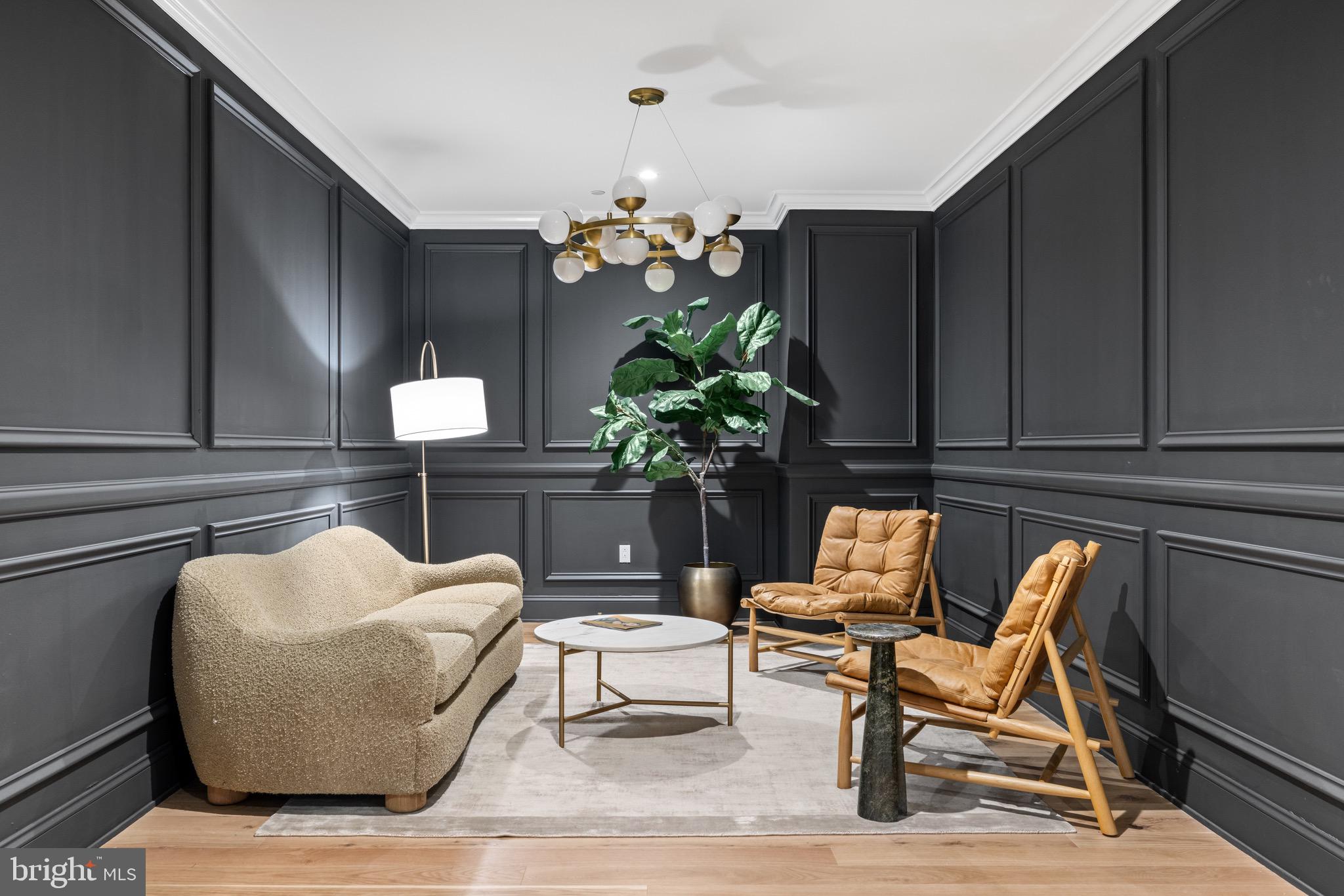 200 South Broad Street, Unit 906 Philadelphia, PA 19102 - Photo 26 of 49 a living room with furniture and a potted plant
