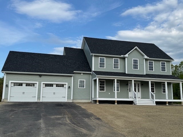430 Mulpus Road Lunenburg, MA 01462 - Photo 1 of 27 a front view of a house with a yard