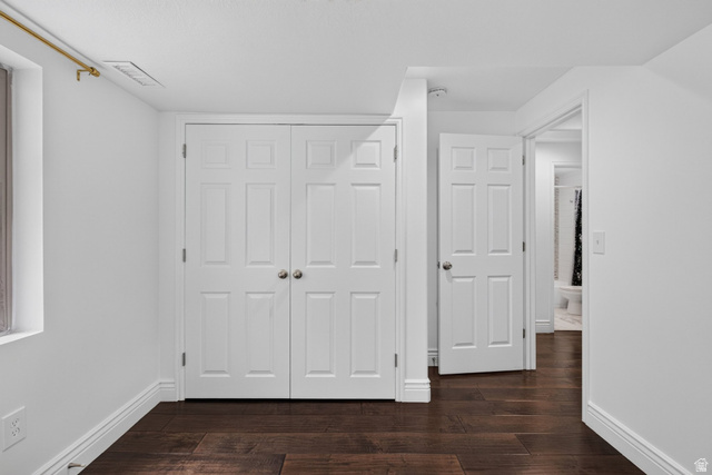 2223 North Pointe Meadow Loop Lehi, UT 84048 - Photo 37 of 56 Room featuring wood-finish flooring, white baseboards, and two paneled doors