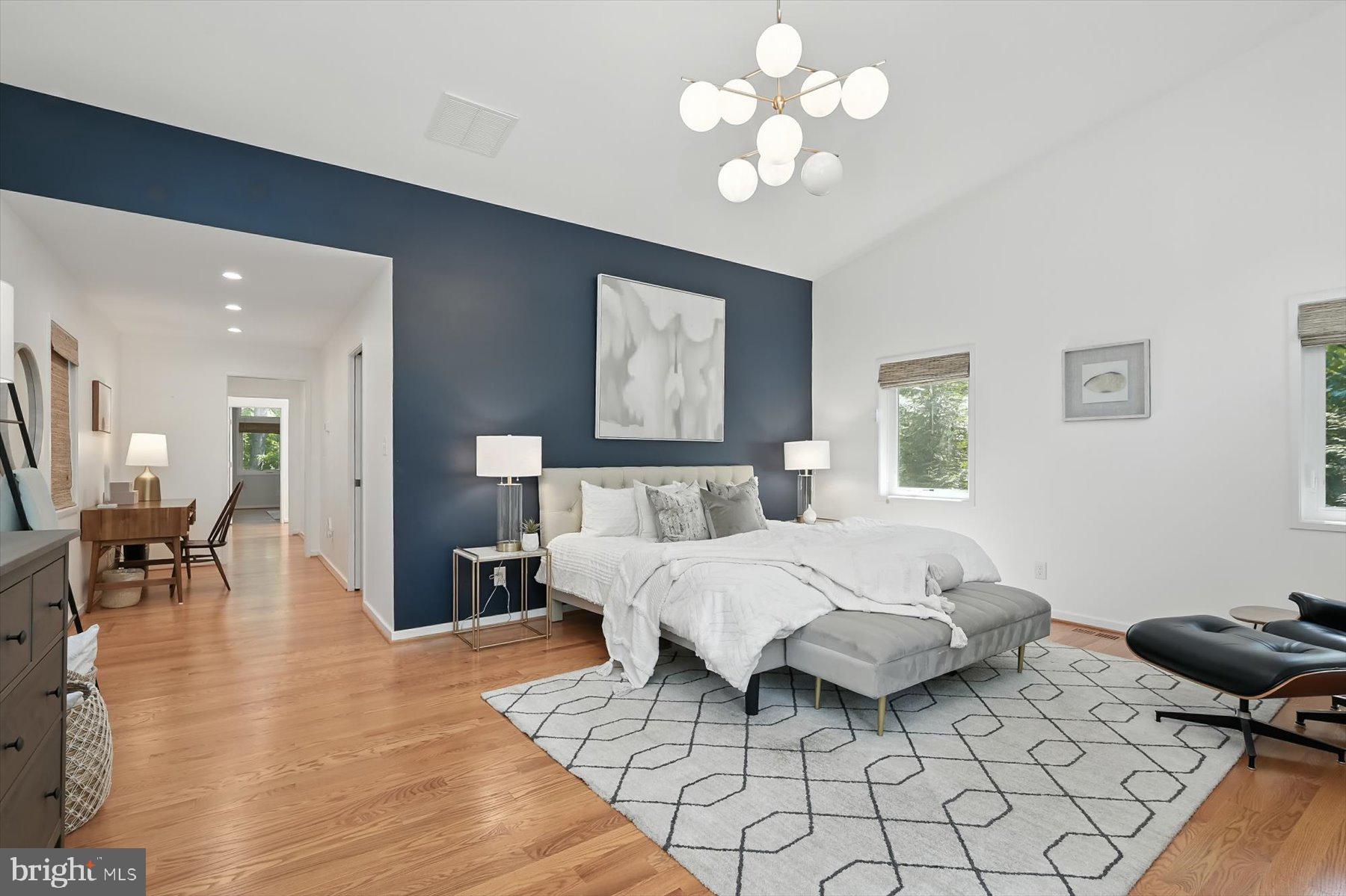 8216 Fenway Road Bethesda, MD 20817 - Photo 19 of 65 a spacious bedroom with a bed and window