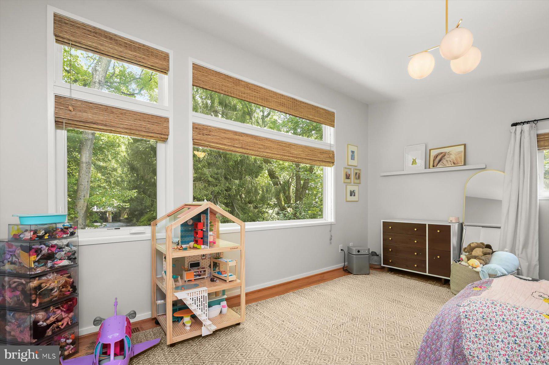8216 Fenway Road Bethesda, MD 20817 - Photo 26 of 65 a bedroom with a bed and a large window