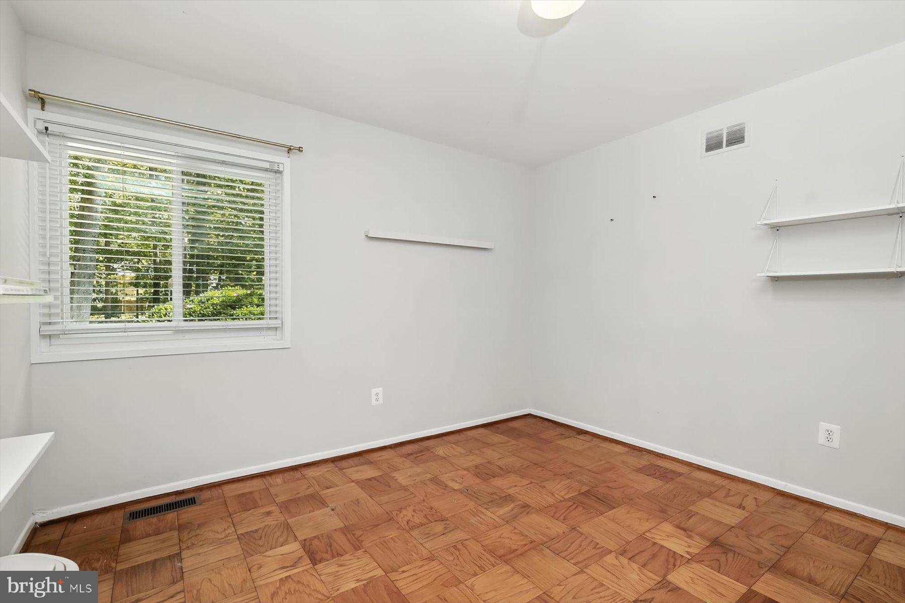 8216 Fenway Road Bethesda, MD 20817 - Photo 40 of 65 a view of empty room with window