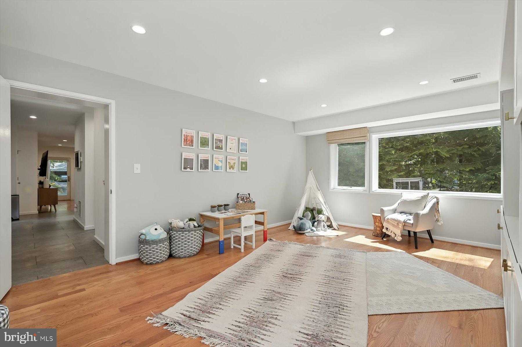 8216 Fenway Road Bethesda, MD 20817 - Photo 44 of 65 a living room with furniture window and wooden floor