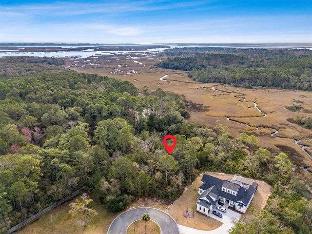 a view of a street with an ocean