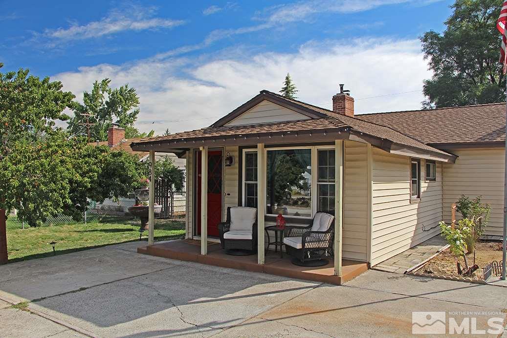 984 Arbutus Street Reno, NV 89509 - Photo 1 of 1 a front view of a house with garden