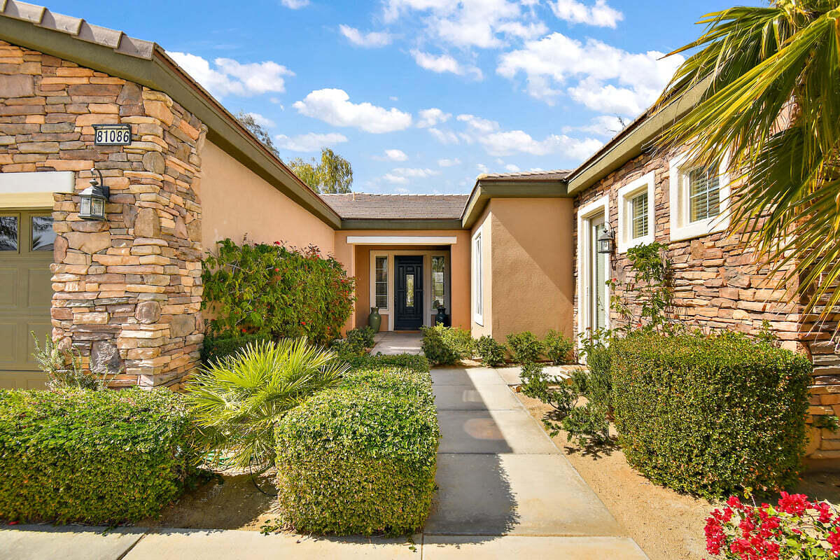 81086 Barrel Cactus Road La Quinta, CA 92253 - Photo 12 of 36 a front view of a house with garden
