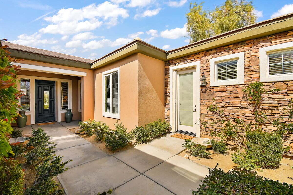 81086 Barrel Cactus Road La Quinta, CA 92253 - Photo 13 of 36 a front view of a house with yard