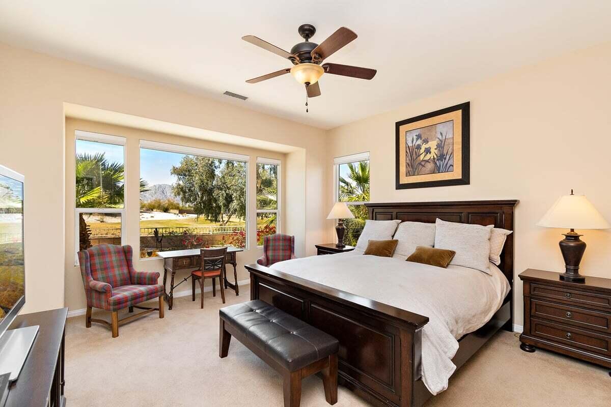 81086 Barrel Cactus Road La Quinta, CA 92253 - Photo 25 of 36 a bed room with a bed and a large window