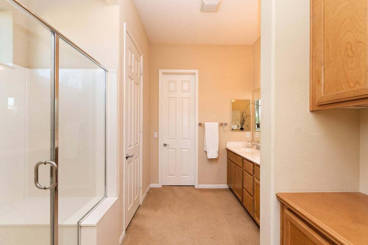 81086 Barrel Cactus Road La Quinta, CA 92253 - Photo 28 of 36 a bathroom with a sink and a mirror