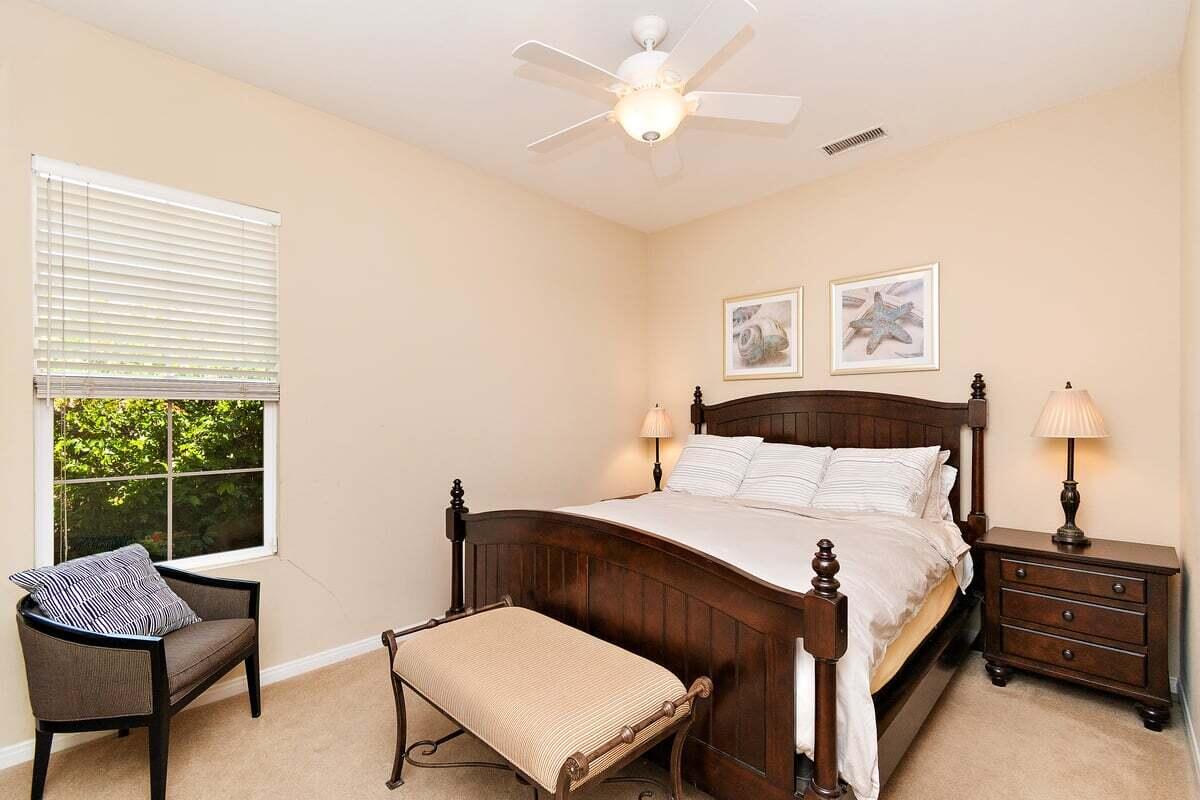 81086 Barrel Cactus Road La Quinta, CA 92253 - Photo 32 of 36 a bedroom with a bed window and couch