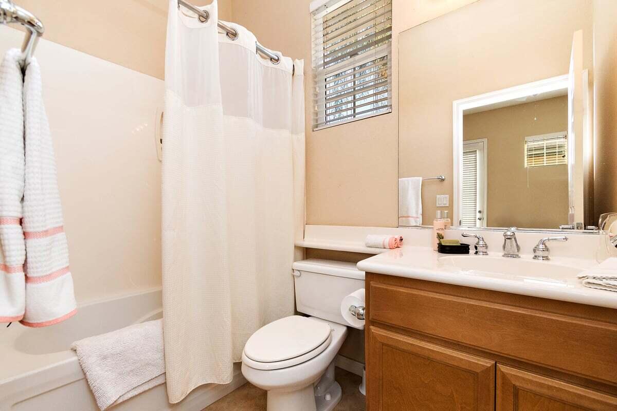 81086 Barrel Cactus Road La Quinta, CA 92253 - Photo 35 of 36 a bathroom with a sink toilet and shower