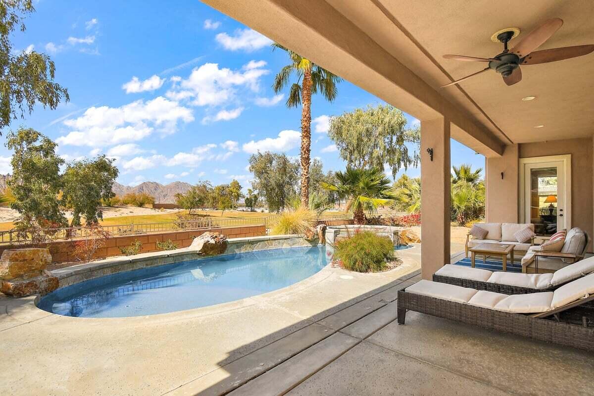 81086 Barrel Cactus Road La Quinta, CA 92253 - Photo 4 of 36 a view of swimming pool with seating area