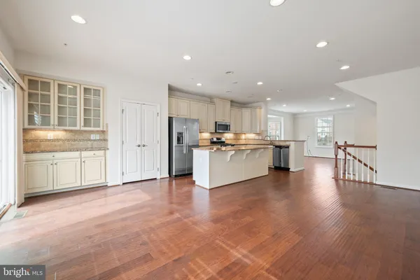 a view of kitchen with wooden floor