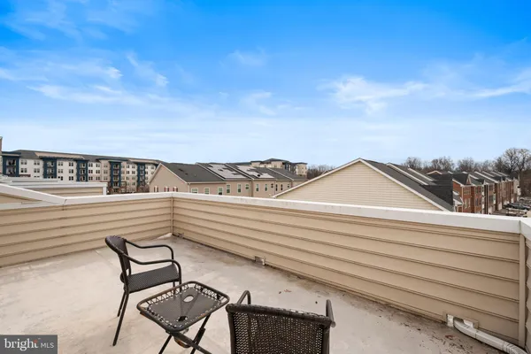 a view of a terrace with a bench