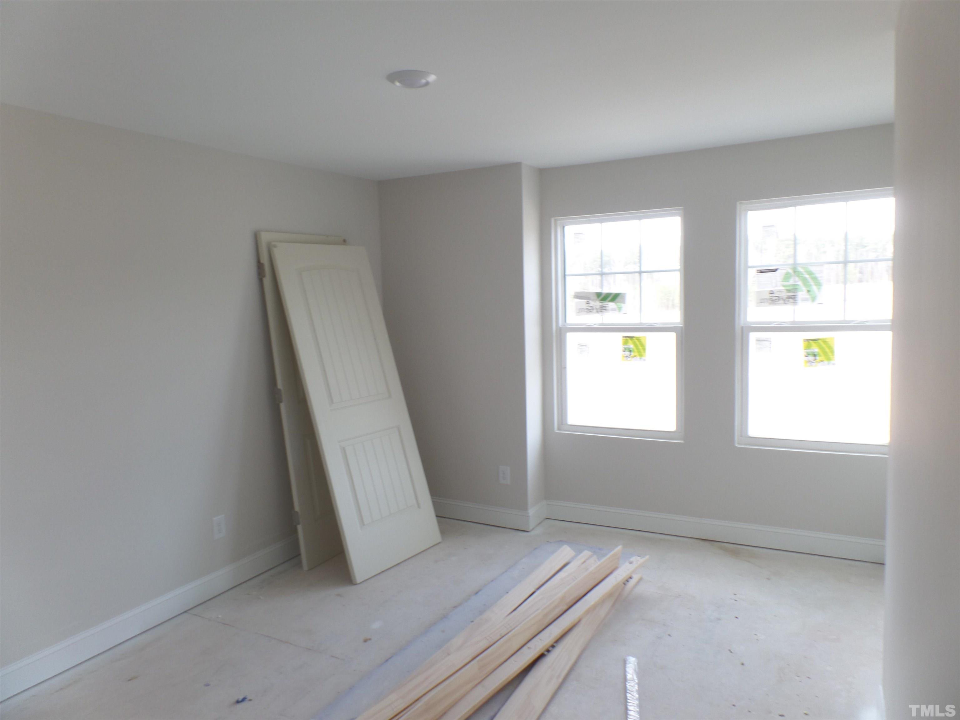 6912 Point Bar Place Raleigh, NC 27616 - Photo 15 of 26 an empty room with windows
