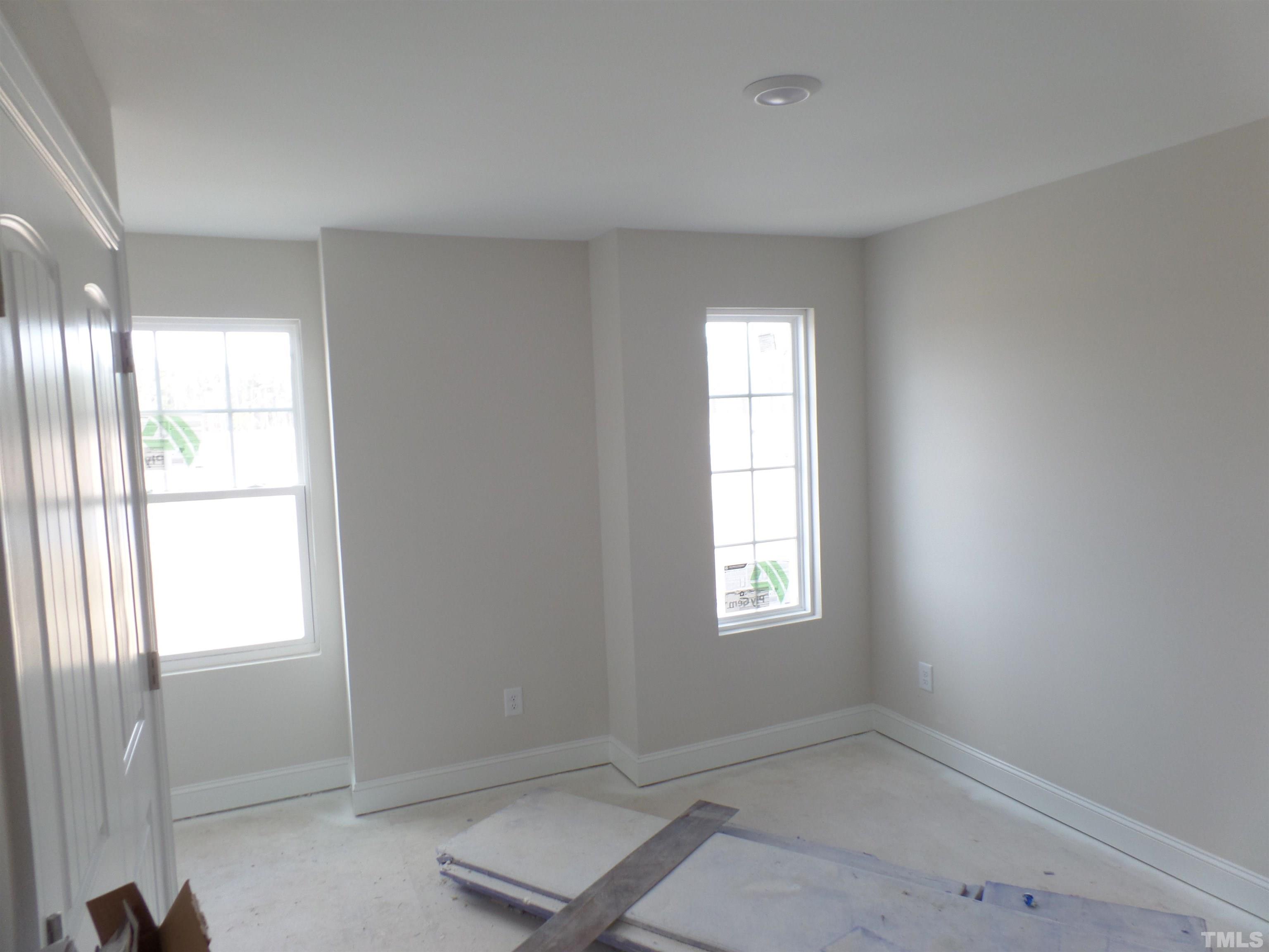 6912 Point Bar Place Raleigh, NC 27616 - Photo 17 of 26 a view of an empty room with a window