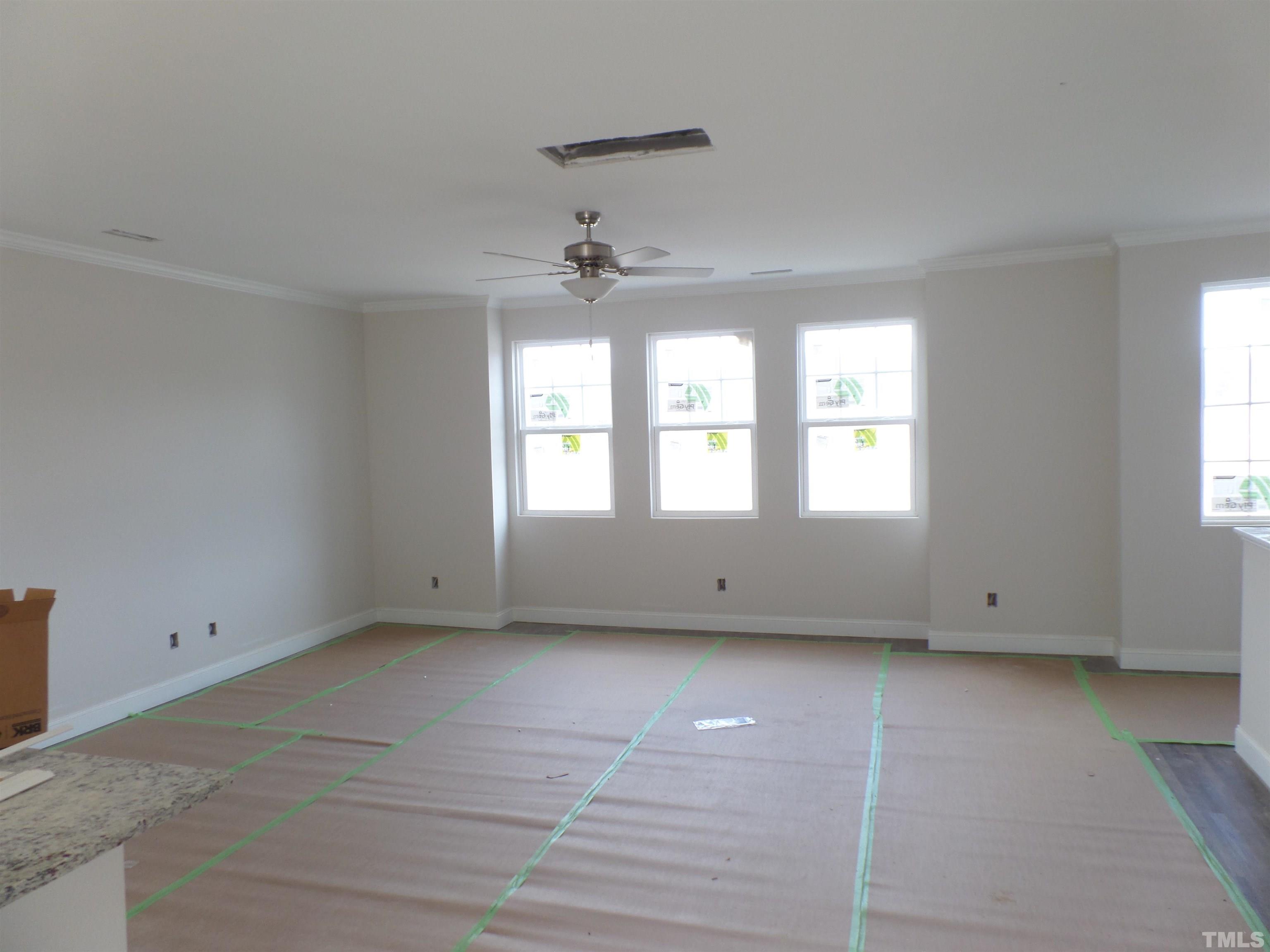6912 Point Bar Place Raleigh, NC 27616 - Photo 6 of 26 a view of an empty room with a window