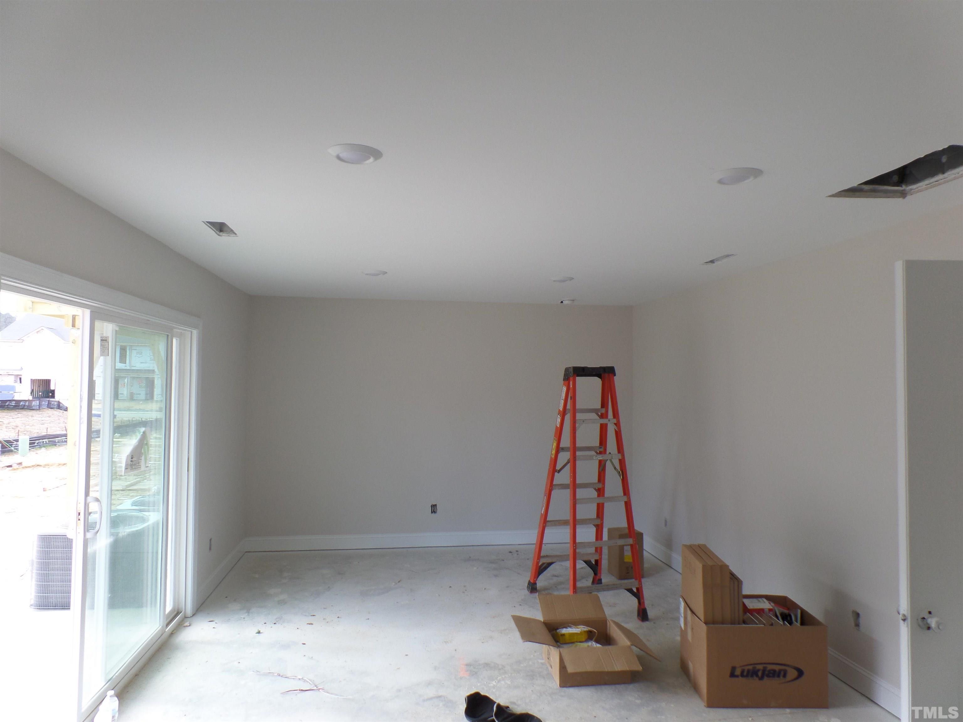 6912 Point Bar Place Raleigh, NC 27616 - Photo 7 of 26 a view of a room with gym equipment