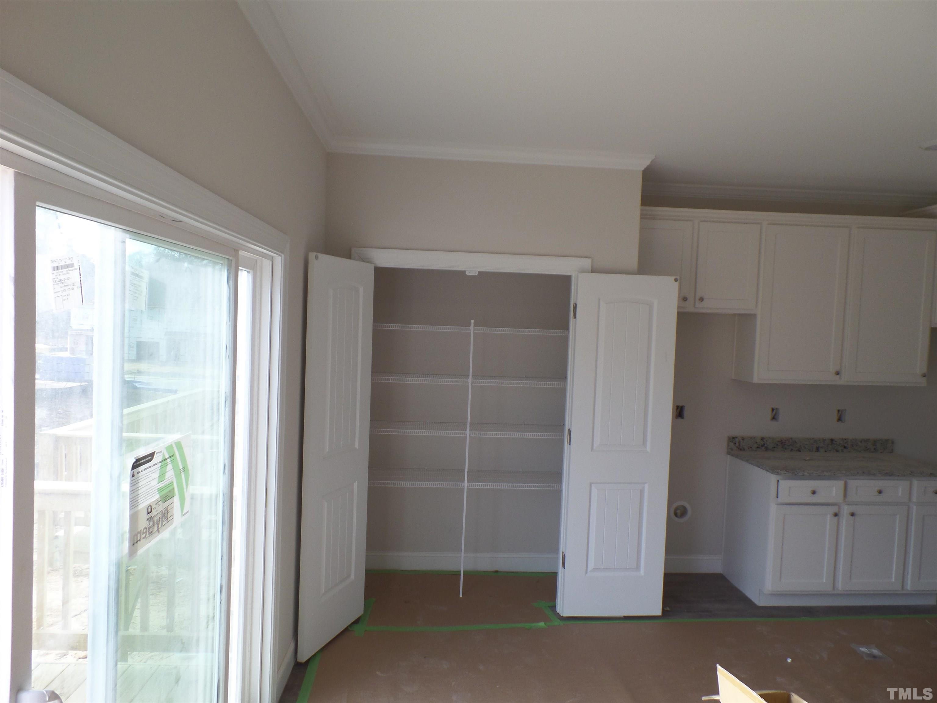 6912 Point Bar Place Raleigh, NC 27616 - Photo 10 of 26 a view of an empty room and window