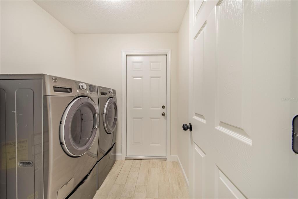 1221 Hartsell Avenue Lakeland, FL 33803 - Photo 13 of 17 a utility room with dryer and washer