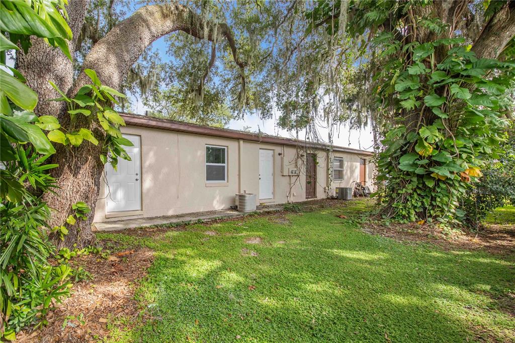 1221 Hartsell Avenue Lakeland, FL 33803 - Photo 14 of 17 a view of a house with a yard