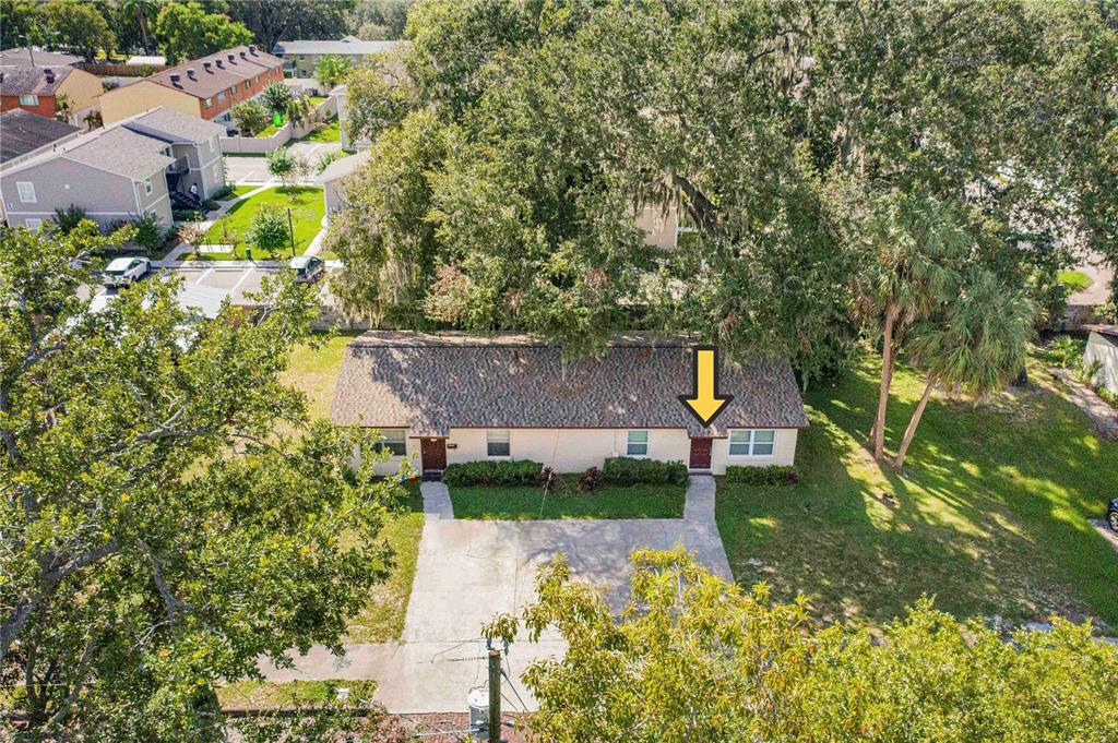 1221 Hartsell Avenue Lakeland, FL 33803 - Photo 16 of 17 an aerial view of a house with a yard and a large tree