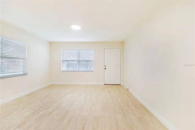 an empty room with windows