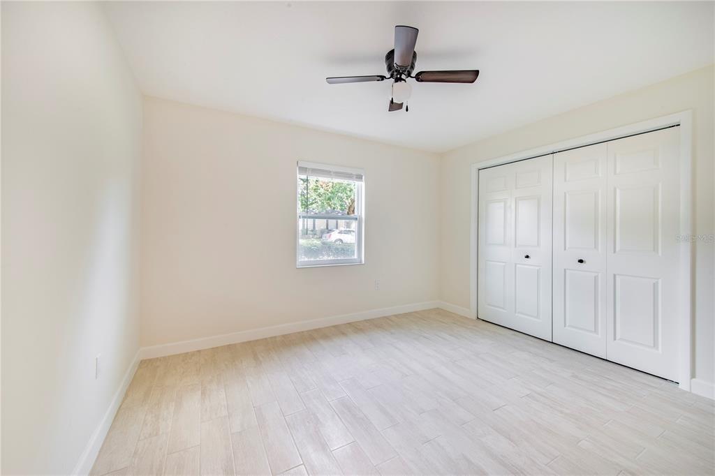 1221 Hartsell Avenue Lakeland, FL 33803 - Photo 10 of 17 a view of room with hardwood floor and window