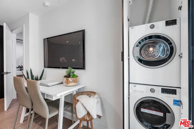 a view of a dining room with furniture and fire place