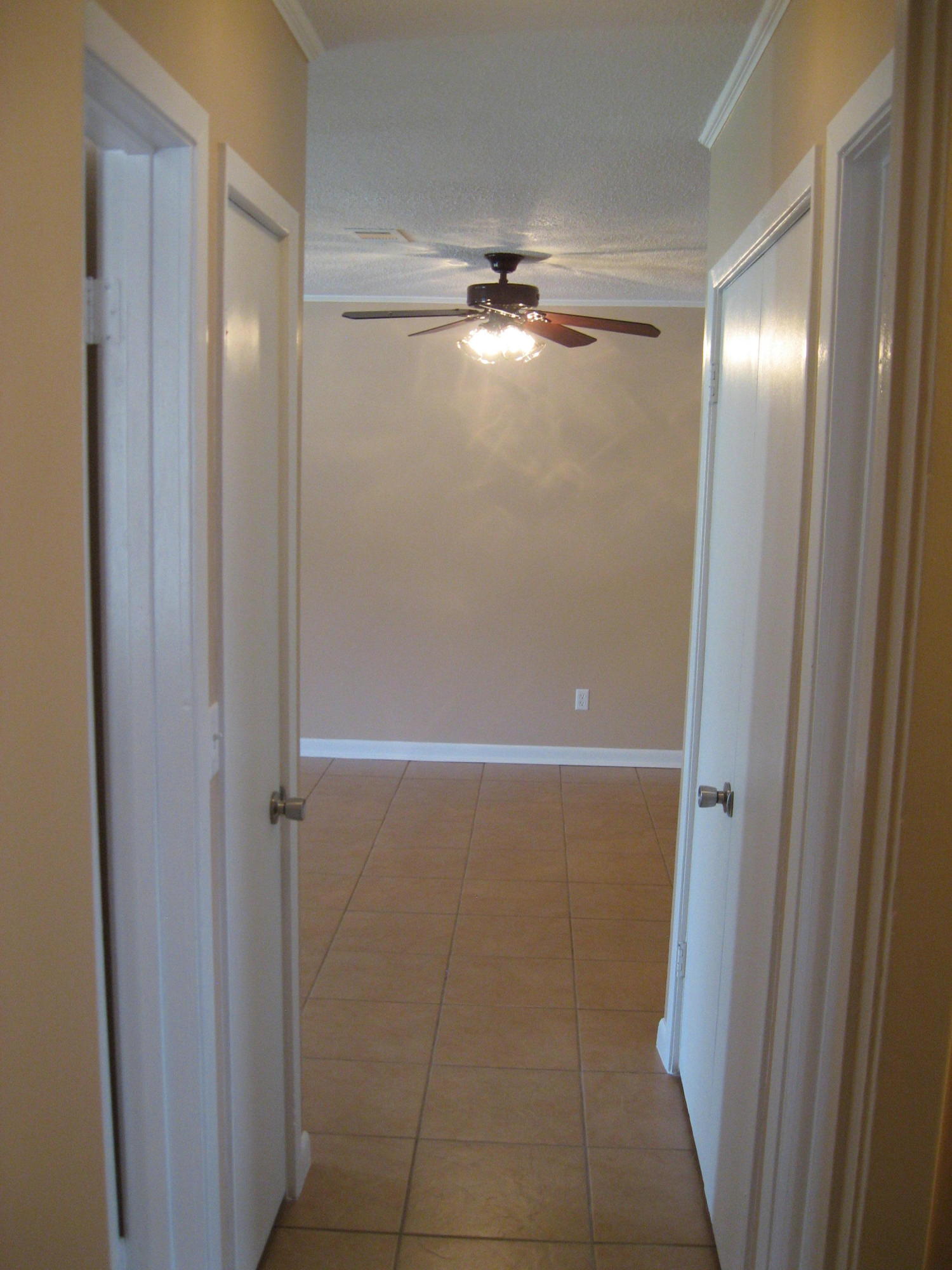 545 Hickory Avenue, Unit C Niceville, FL 32578 - Photo 7 of 11 a bathroom with a glass shower door