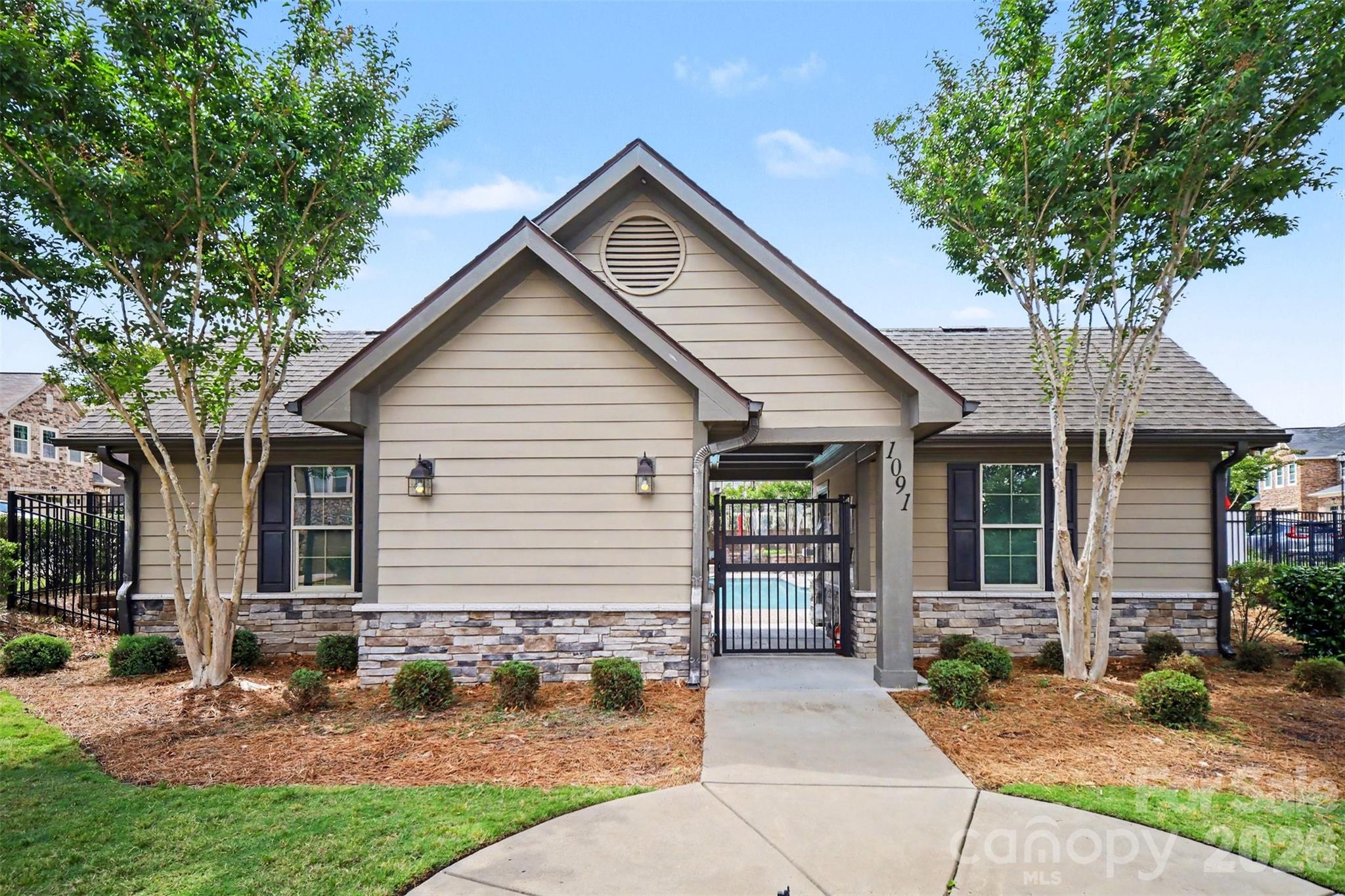 1029 Archibald Avenue Fort Mill, SC 29708 - Photo 39 of 45 a front view of a house with garden