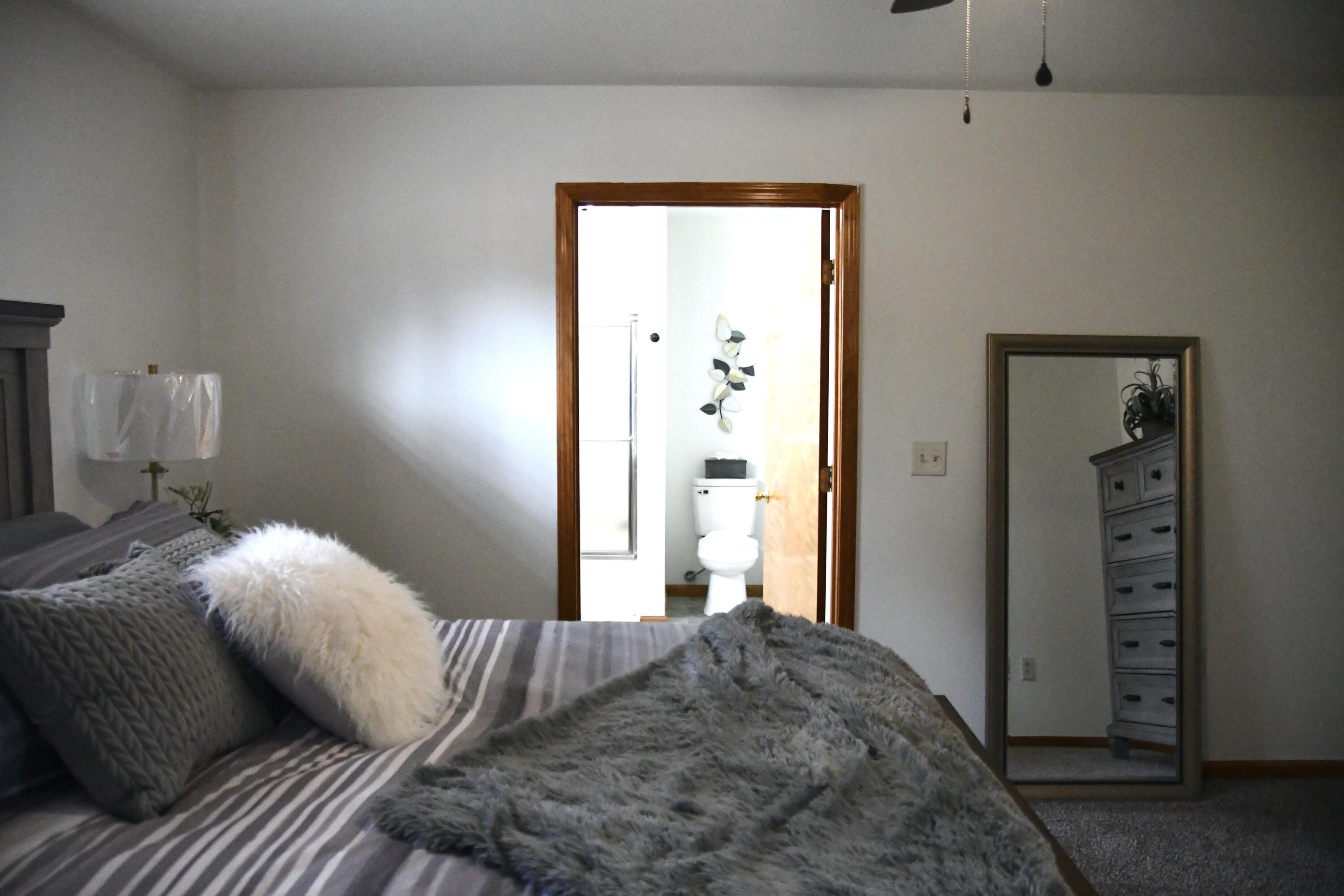 2021 Morrisville Road Bolivar, MO 65613 - Photo 18 of 36 Primary Bedroom Toward En Suite