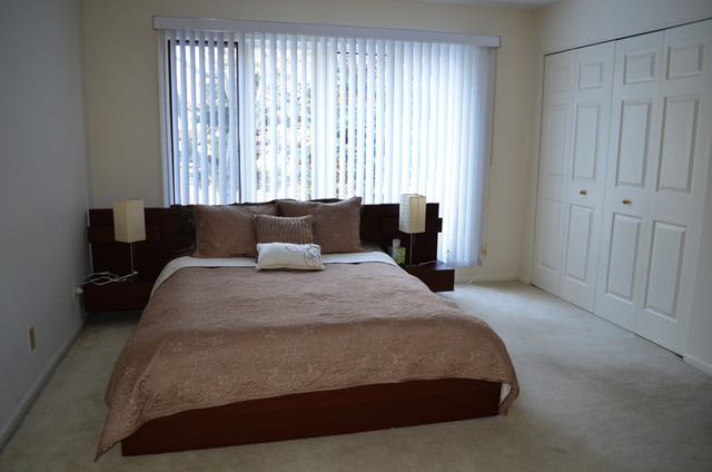 1829 Koehling Road Northbrook, IL 60062 - Photo 7 of 13 a bedroom with a bed and a window