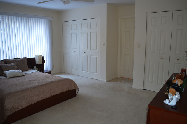 1829 Koehling Road Northbrook, IL 60062 - Photo 8 of 13 a bedroom with a bed and a closet