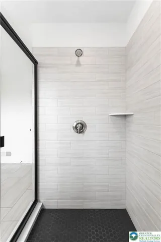 a aerial view of a house with a yard