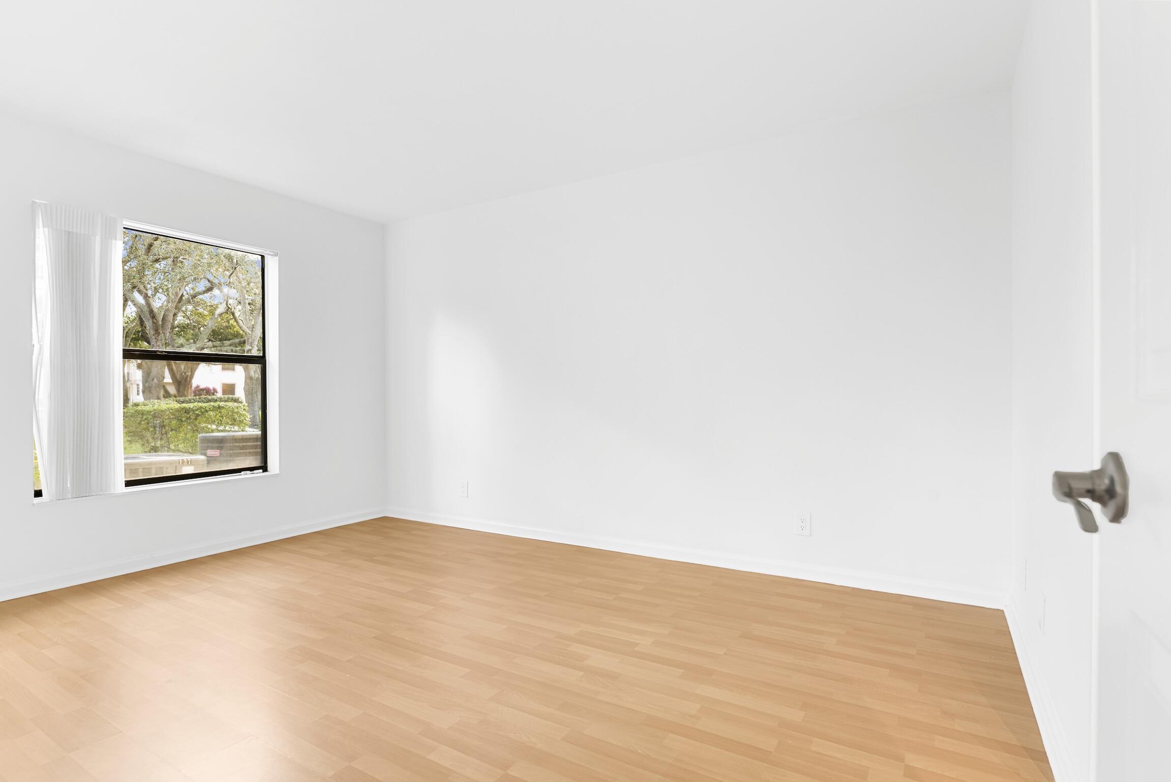 3129 Millwood Terrace, Unit M137 Boca Raton, FL 33431 - Photo 12 of 58 Main Bedroom