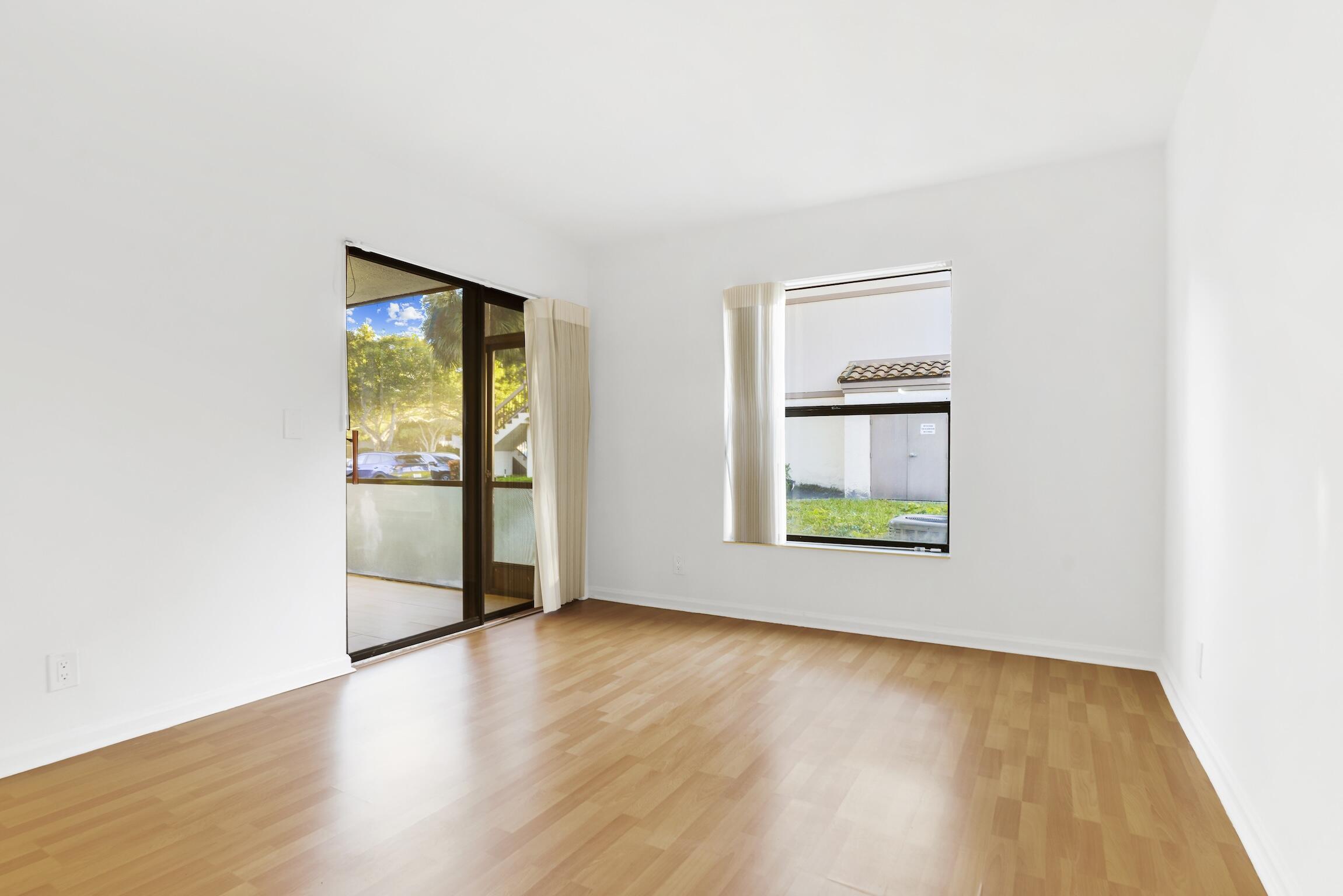 3129 Millwood Terrace, Unit M137 Boca Raton, FL 33431 - Photo 13 of 58 Main Bedroom