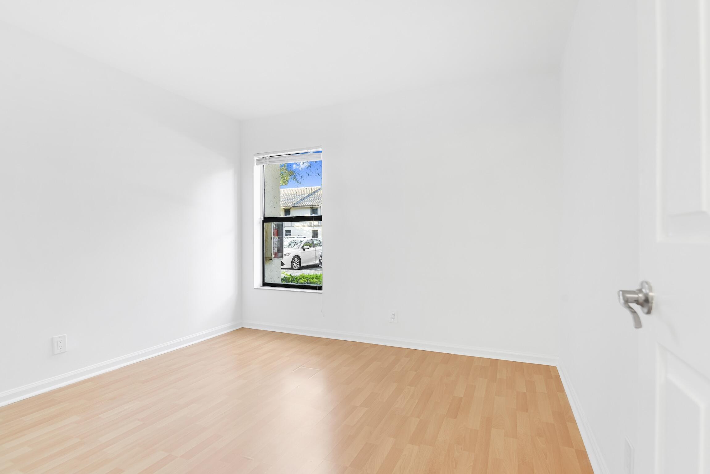 3129 Millwood Terrace, Unit M137 Boca Raton, FL 33431 - Photo 20 of 58 Guest bedroom