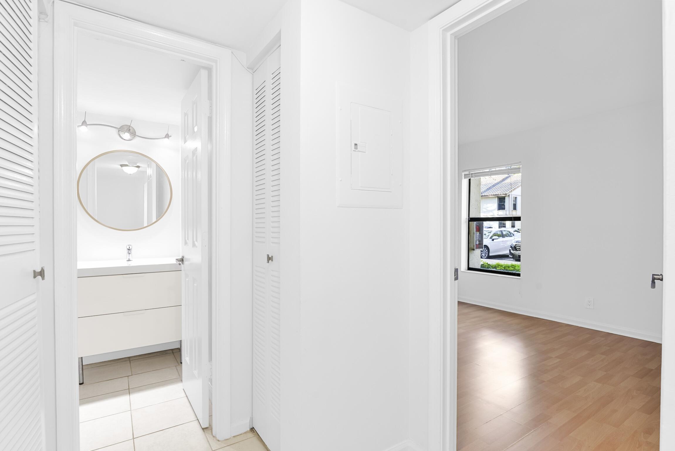 3129 Millwood Terrace, Unit M137 Boca Raton, FL 33431 - Photo 29 of 58 Guest bath/bedroom