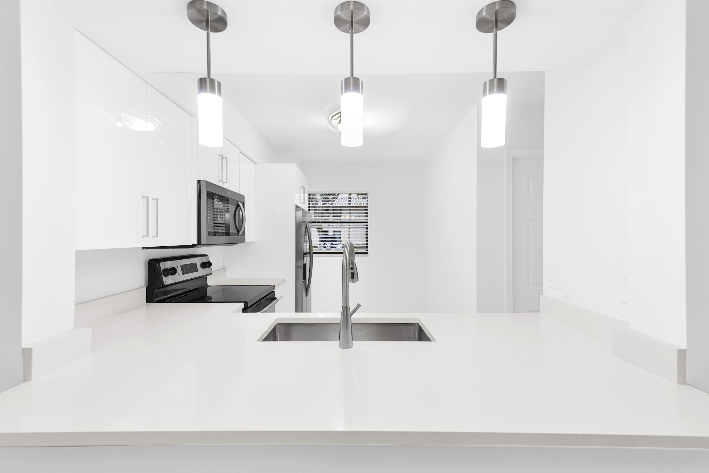 3129 Millwood Terrace, Unit M137 Boca Raton, FL 33431 - Photo 4 of 58 Kitchen