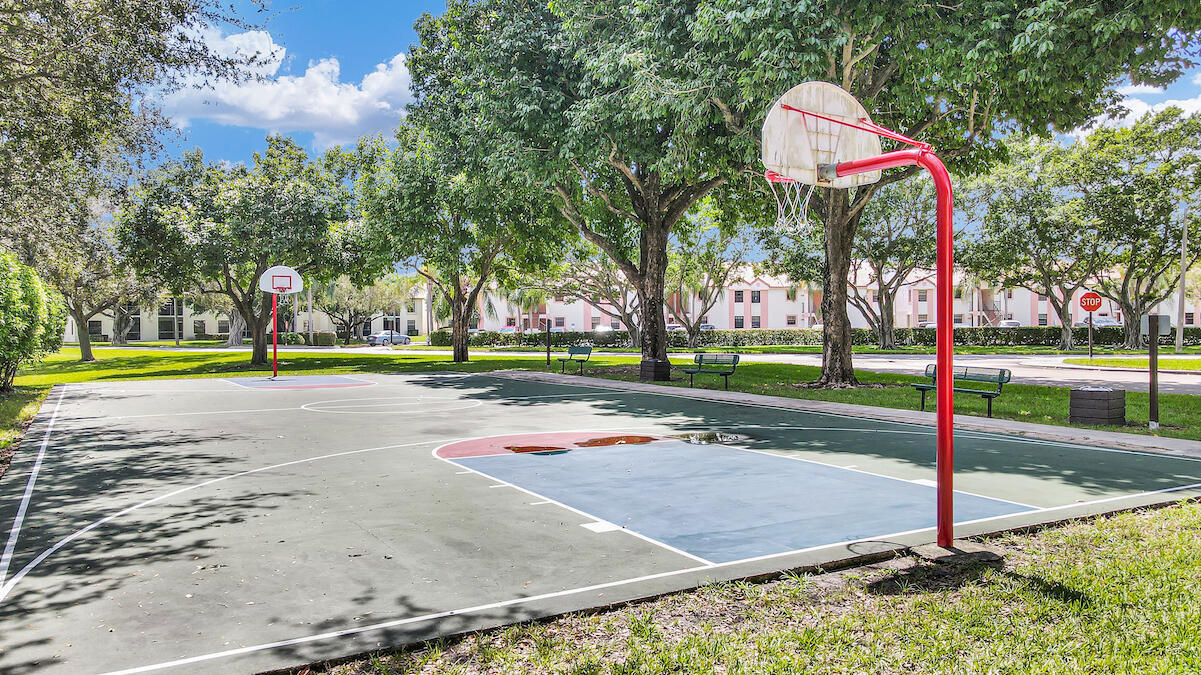 3129 Millwood Terrace, Unit M137 Boca Raton, FL 33431 - Photo 42 of 58 Tennis Court