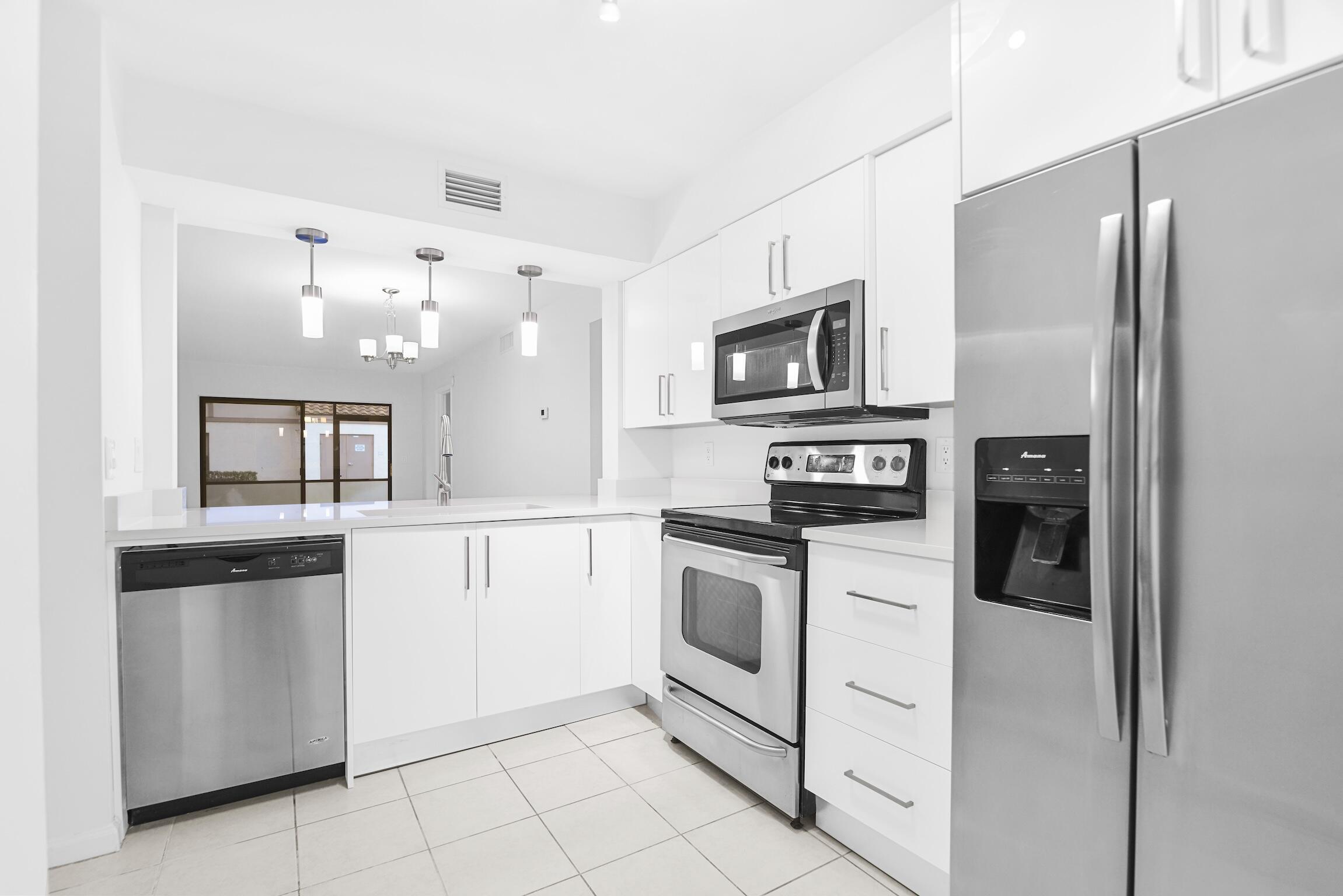 3129 Millwood Terrace, Unit M137 Boca Raton, FL 33431 - Photo 5 of 58 Kitchen