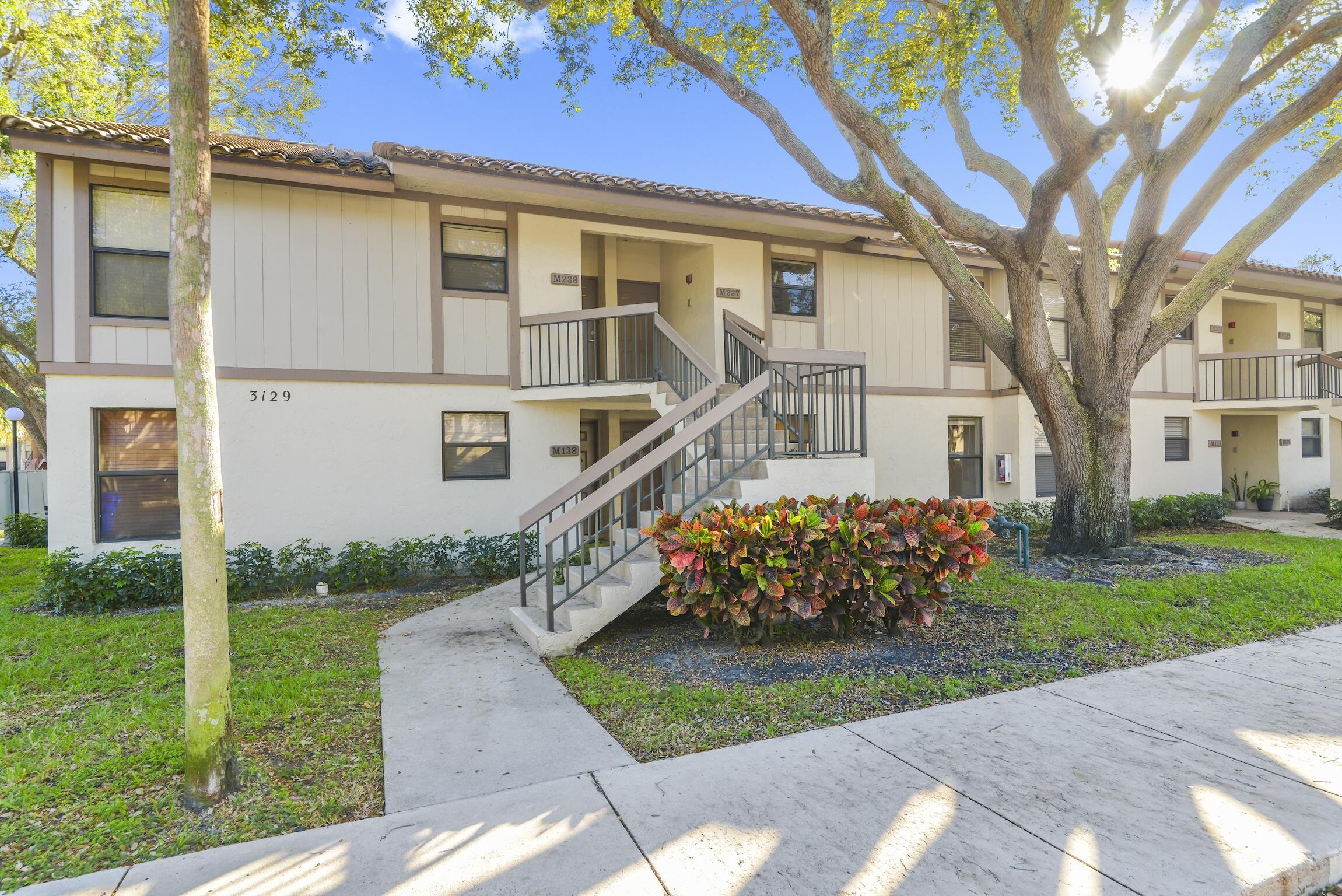 3129 Millwood Terrace, Unit M137 Boca Raton, FL 33431 - Photo 51 of 58 Exterior front